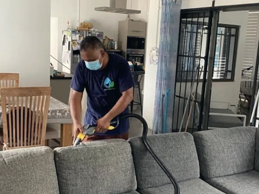 Upholstery being cleaned in a residential living room